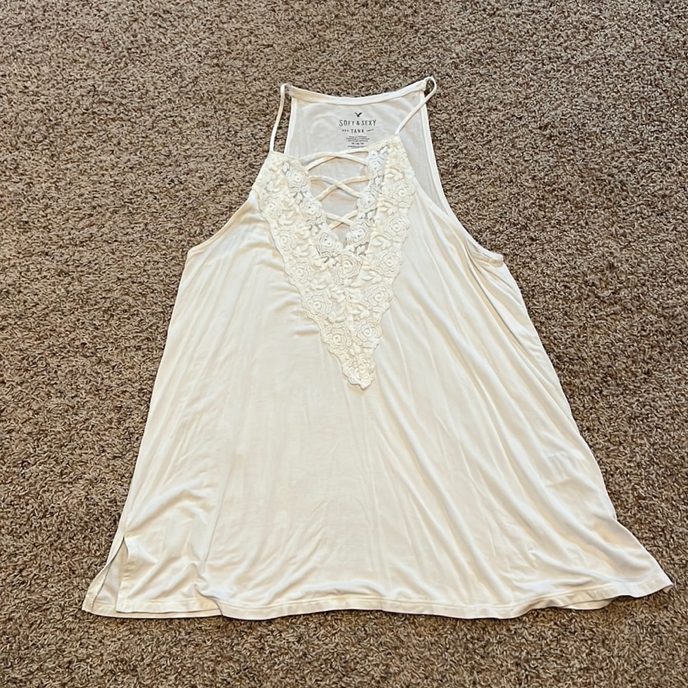 White, lace top with crisscrossing